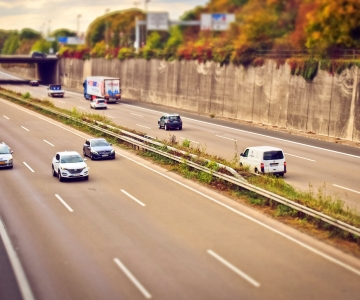 various vehicles on a two way, 6 laned highway